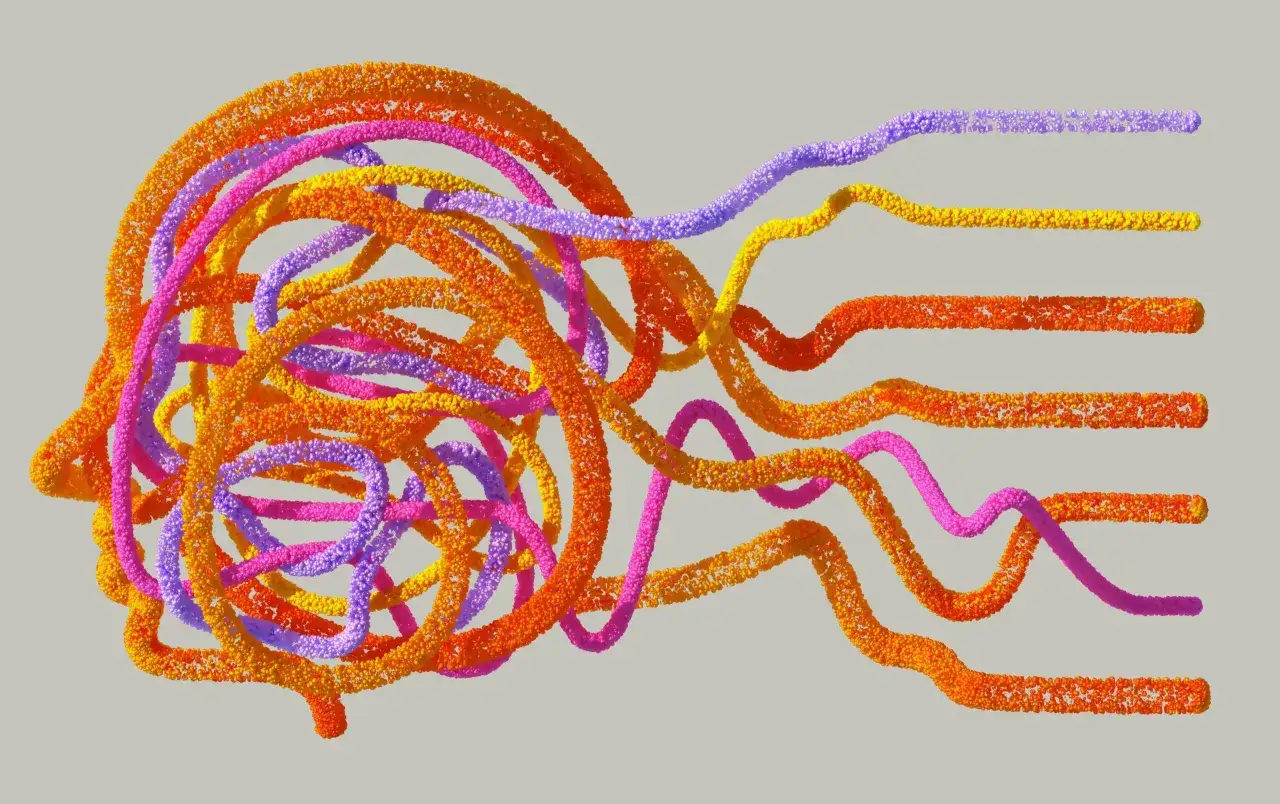 Bunte, verdrehte Str&auml;nge formen eine Kopfform, die an Torticollis spasticus erinnert.